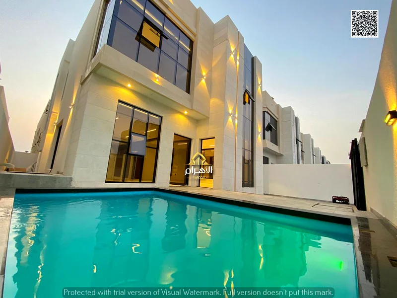Villa with private pool, including registration fees, without down payment, for everyone to own, close to services and exit to Dubai and Sheikh Mohamm63901474130945111