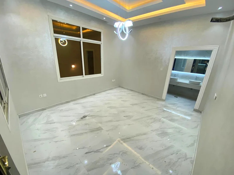 For sale, a villa, including registration and ownership fees, directly opposite the mosque, two floors, stone facade, with the possibility of easy ban63902536700802113