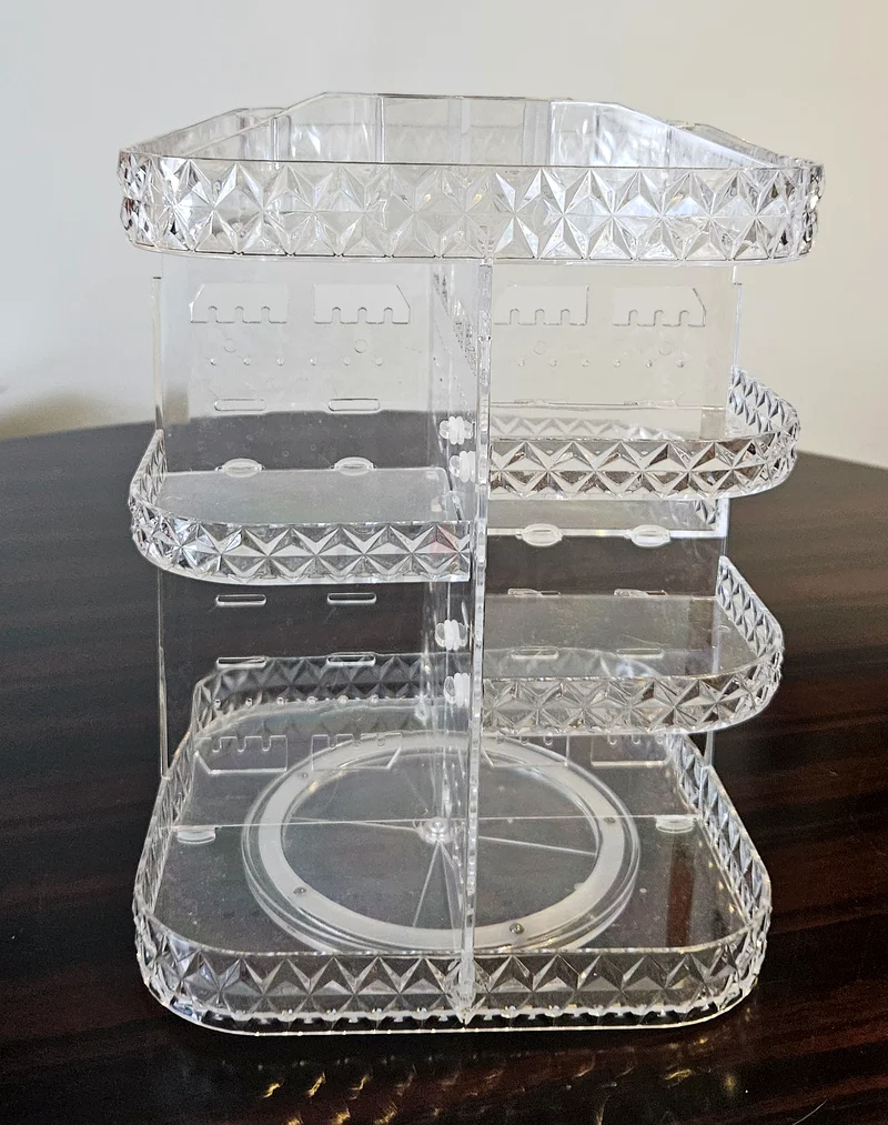 Clear acrylic rotating organizers — commonly used for cosmetics, toiletries, or small items63211418729219112