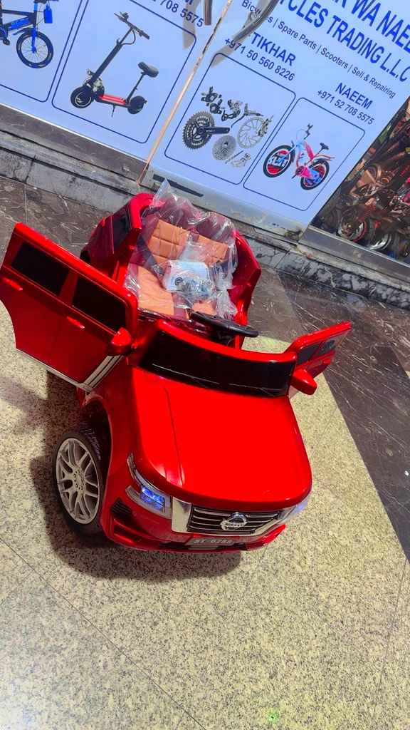 Children trying car with remote control63227807169027112