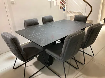 Extendable Granite Dining room table with 6 chairs
