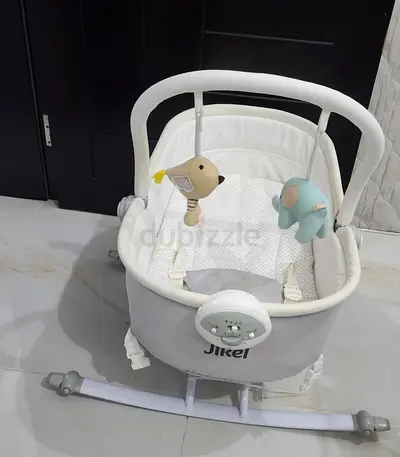 Cozy and Cute Baby Bouncer with Toys!Jikel Rella is capable of being a rocker and a bassinet.