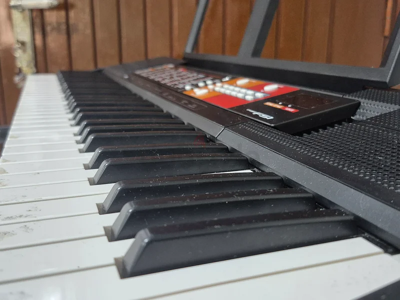 Portable Keyboard/Piano for sale (with free stand)63207396631171114