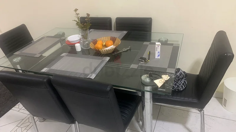 طقم طاولة طعام أنيقة من الزجاج مع 6 كراسي سوداء63179862241795114