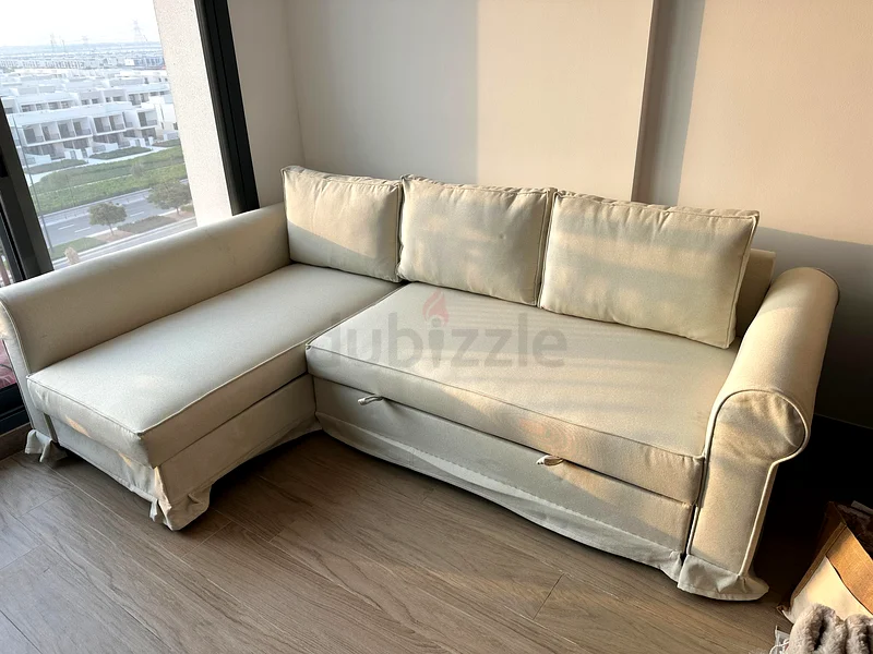 أريكة على شكل حرف L مع سرير وتخزين63185234175619111