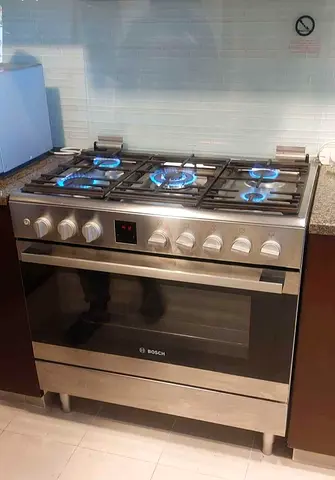 Bosch 5 hobs Full Gas cooker 90cm with Fan inside oven and digital clock