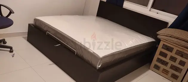 Ikea king size hydraulic bed with Ikea mattress