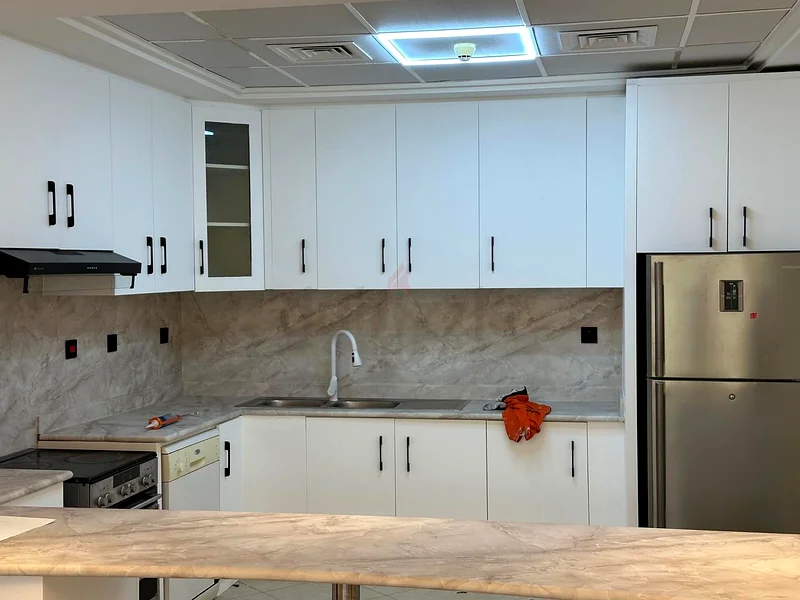Bust quality wallpaper installation and wood staker rapping and kitchen cabinet wrapping and gals63440511371267113