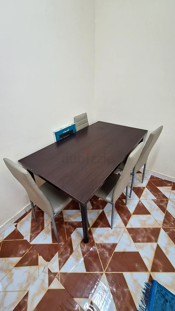 Selling our Stylish Brown Dining table and beige color Chairs4 SeaterDM for more details63179389010691111