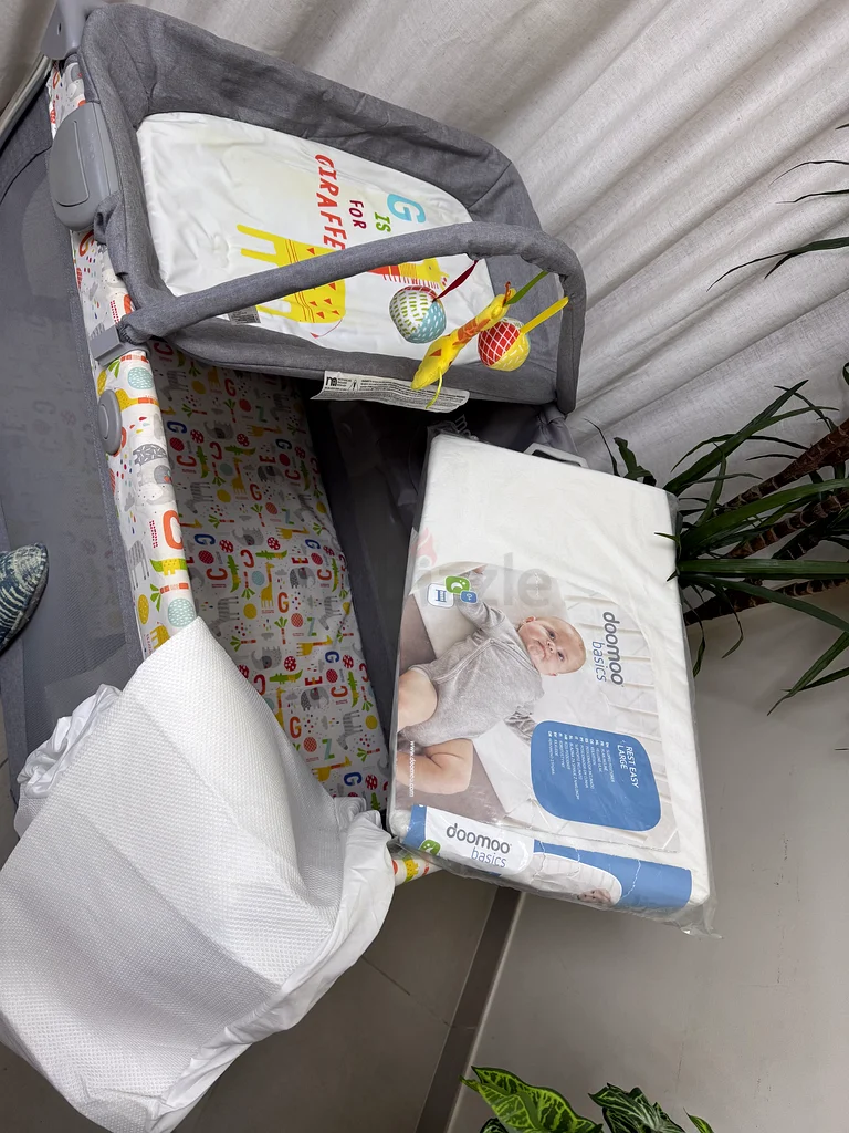 Baby bed with water proof bed sheet and sloped positioner63176190943745112