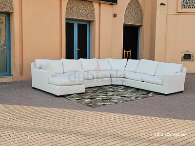 Selling CrateBarrel ___ Axis feather filled Ushape Sofa beige perfect Condition
