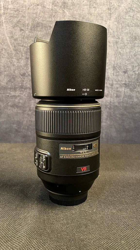 Micro Nikkor
105mm  f/2.8
Nikon Hood HB-38
Nikon lens filter 
All made in Japan63173508983810112
