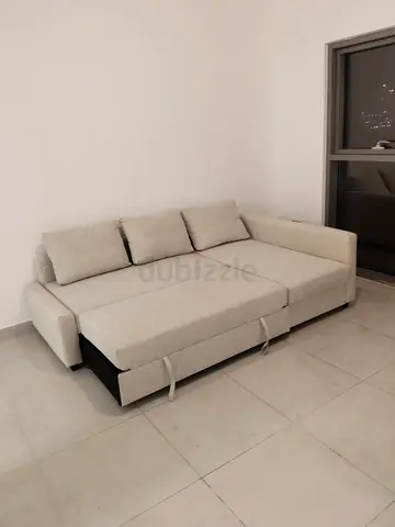 Ikea L Shape Sofa cum bed with big storage in L , and You can fix the L left and right any side