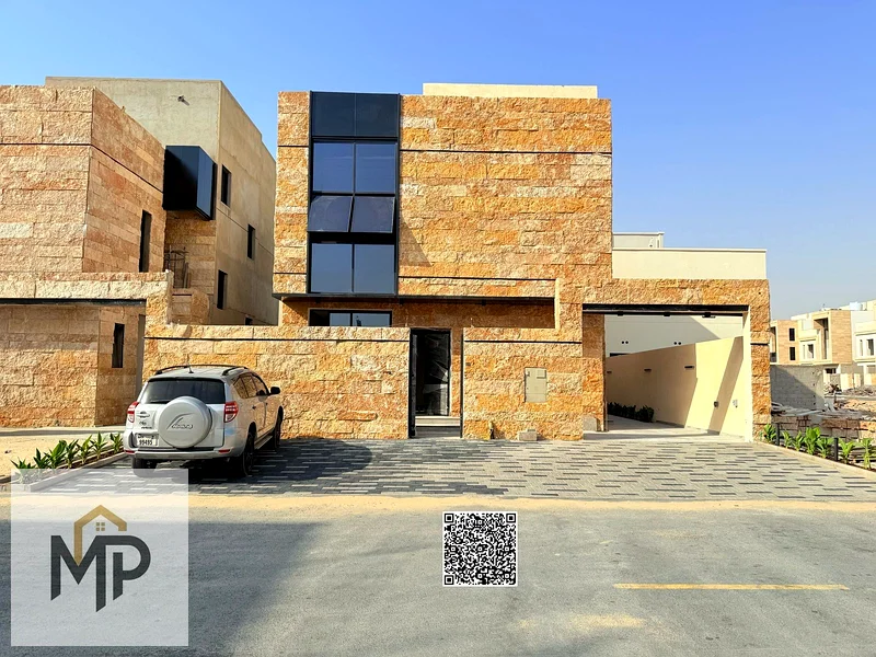 Villa for sale - two floors and a large courtyard - close to Sheikh Mohammed bin Zayed Road - freehold for all nationalities for life63882331798915111