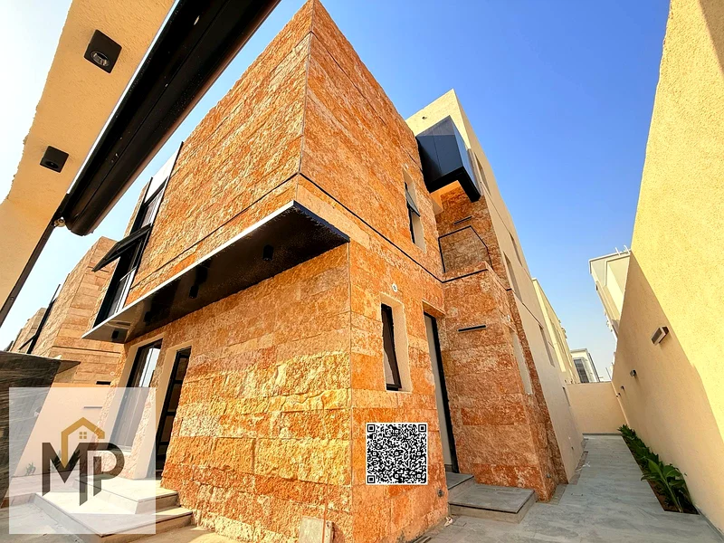Villa for sale - two floors and a large courtyard - close to Sheikh Mohammed bin Zayed Road - freehold for all nationalities for life63882331798915112
