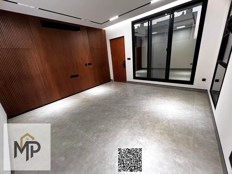 Villa for sale - two floors and a large courtyard - close to Sheikh Mohammed bin Zayed Road - freehold for all nationalities for life63882331798915114