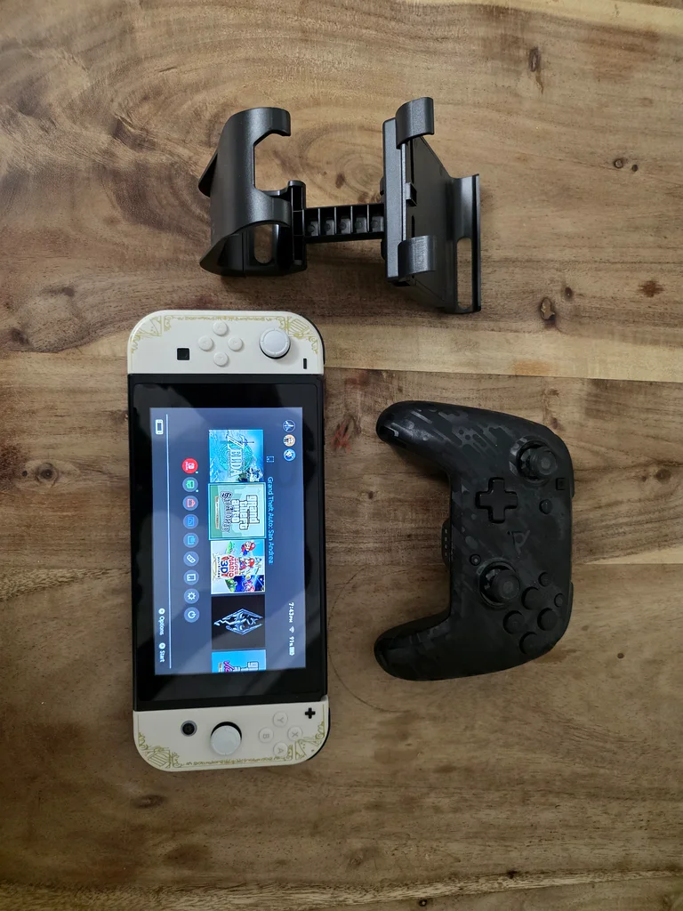 نينتندو سويتش + وحدات تحكم جوي كونز بتصميم ذيلدا + وحدة تحكم احترافية + قبضة لوحدة التحكم63206884012801110