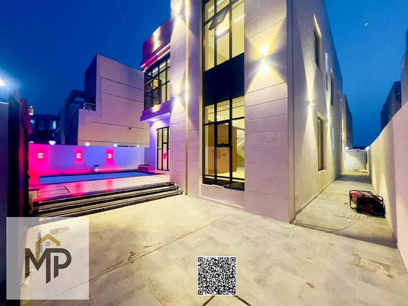 Luxury modern villa for sale in Al Helio 2 - Ajman | High-end finishes and a prime location! With a swimming pool, registration fees included.63903291536129112