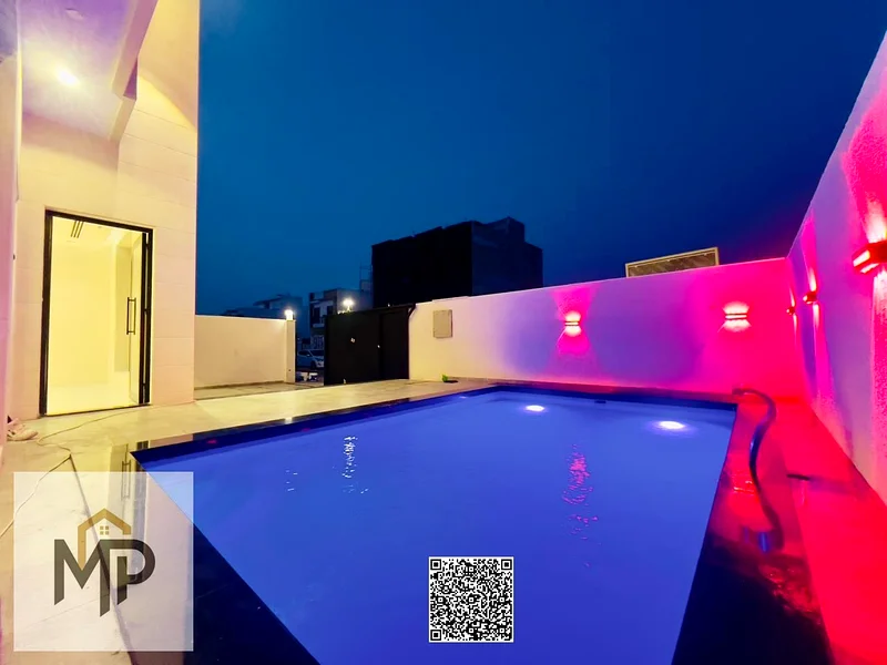Luxury modern villa for sale in Al Helio 2 - Ajman | High-end finishes and a prime location! With a swimming pool, registration fees included.63903291536129114
