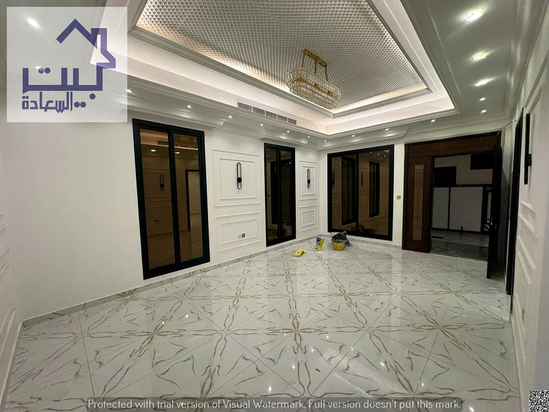 For sale in Al Helio 2 area, consisting of two floors, 5 master bedrooms, a bathroom, a maid's room, a fully equipped main kitchen, and a preparatory63905218034562114