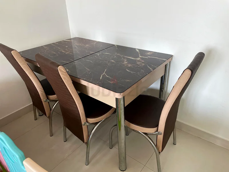 Stylish Dining Table with Elegant Marble Finish. With 6 chairs63209351915905114