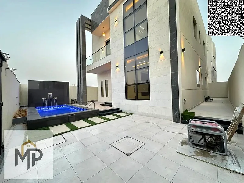 For sale - a luxurious villa with a swimming pool in Ajman, high-end finishing, modern design,63905079857027113