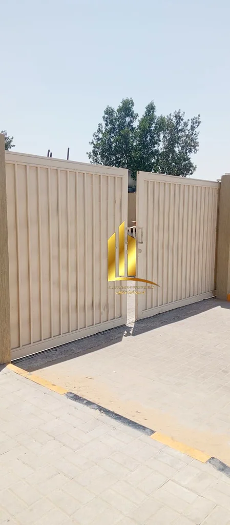 Investment property for sale in Al Sajaa Industrial area, consisting of a yard + a large warehouse + 2 shops in the front. The property is only two mo63195059689730111