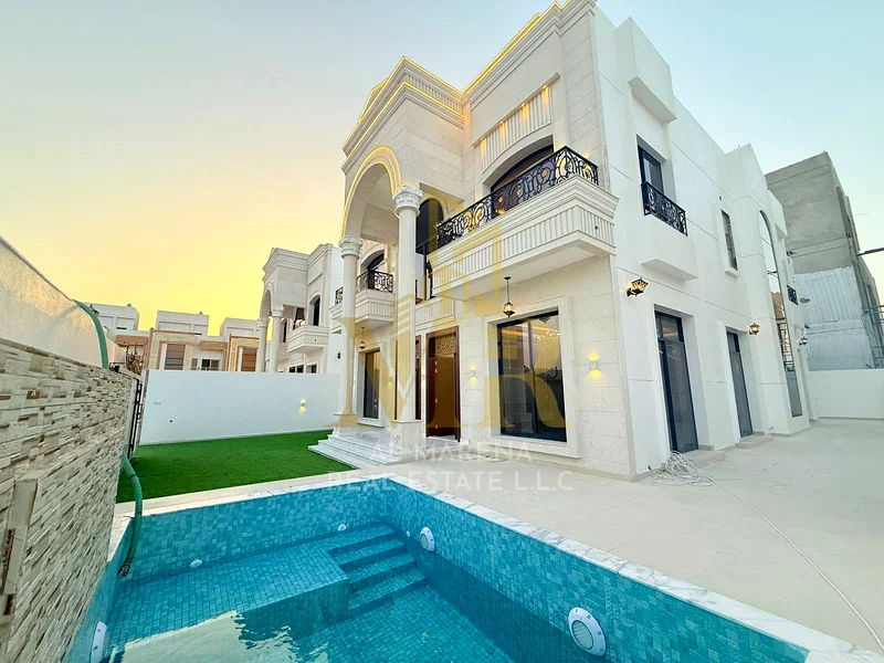 Villa with a price that includes registration and ownership fees, located on the main street, ready for habitation in the finest areas of Ajman with f63905079791363112