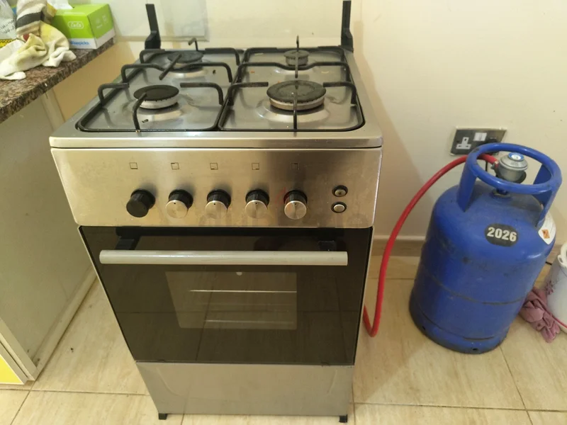 موقد غاز حرّي مكوّن من 4 مواقد مع أسطوانة غاز63199139466115112