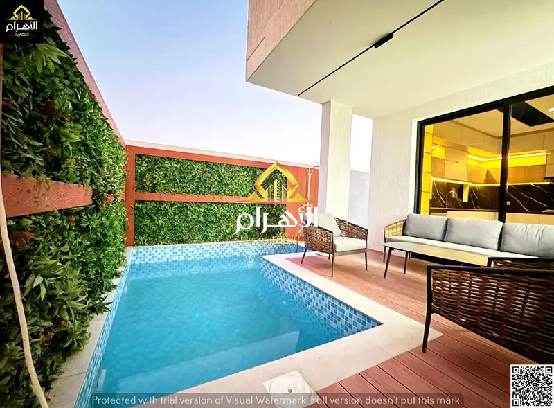 Distinctive villa in Al Bahia | With swimming pool and sitting area | Super deluxe finishing.63882550824194112