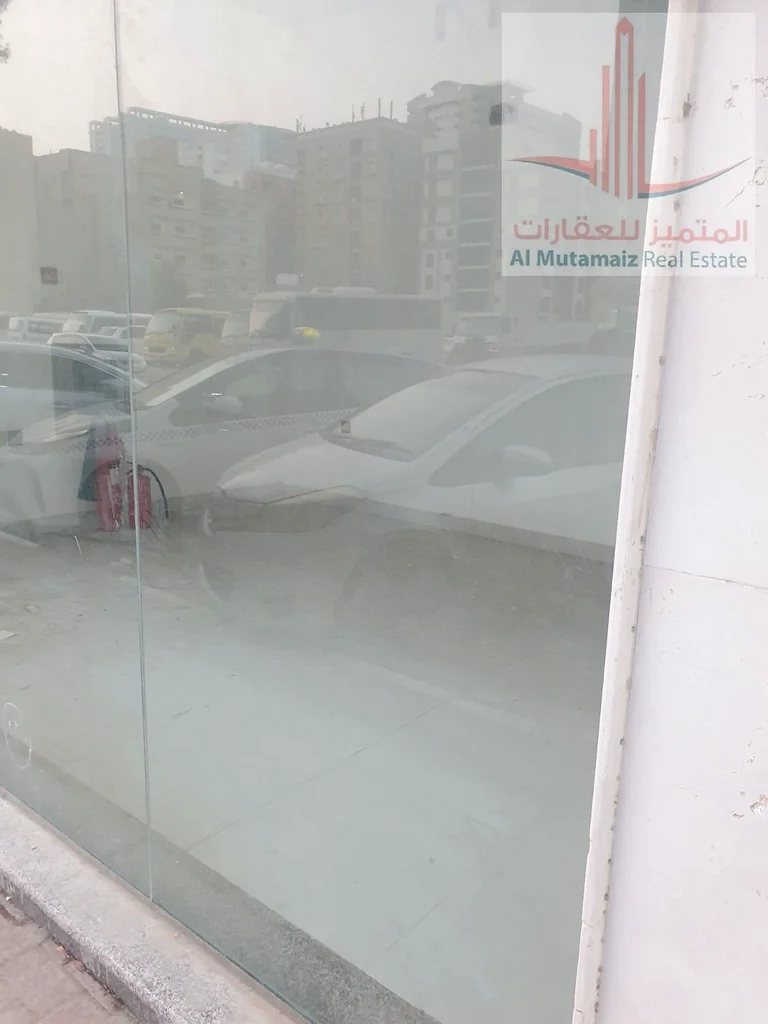 Shop for annual rent in Rashidiya 2, excellent location on a main street, large area63222329879937114