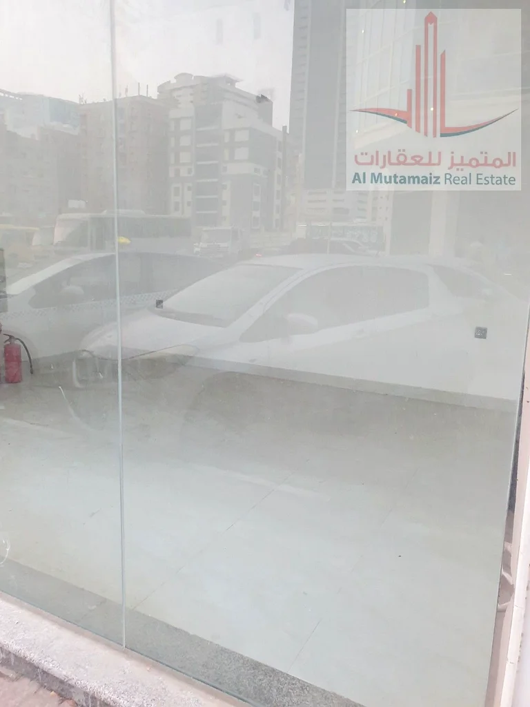 Shop for annual rent in Rashidiya 2, excellent location on a main street, large area63222329879937113