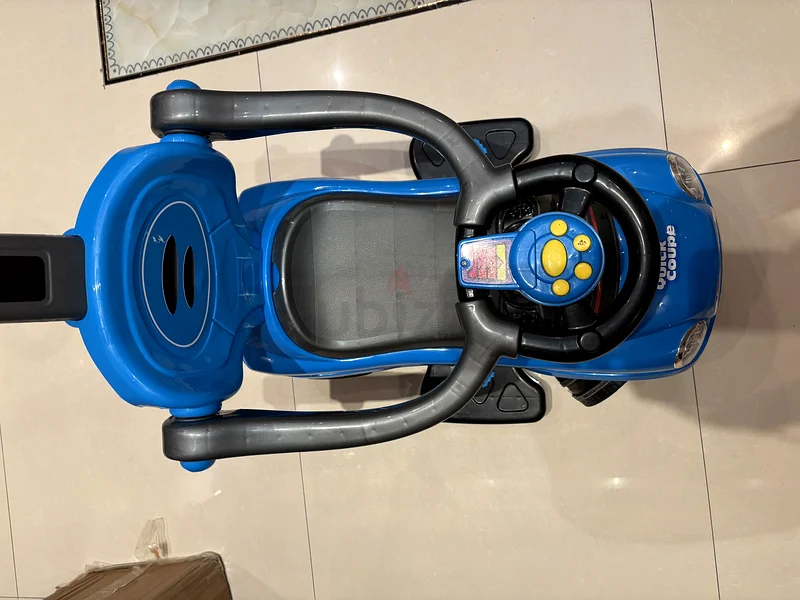 Ride-On Fun: Blue Baby Walker with Push Handle63202685745410112