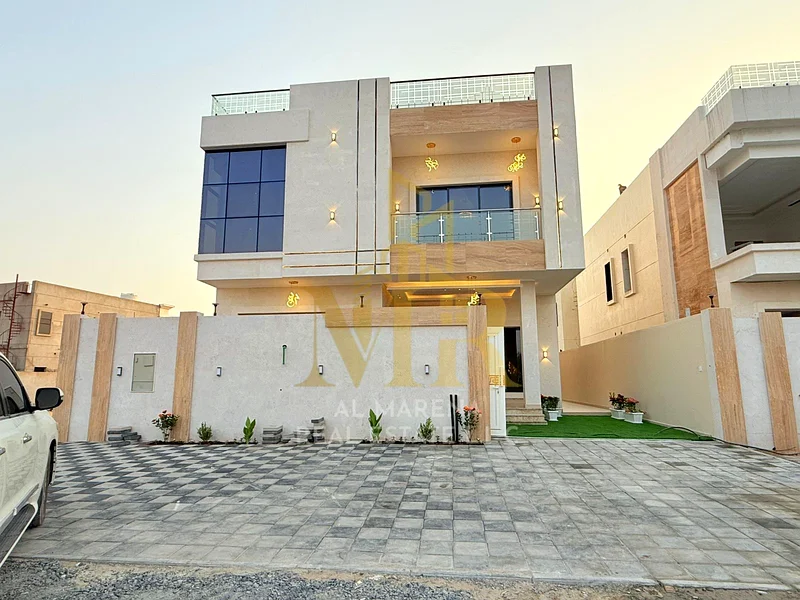 🏡 For Sale - Luxury Villa on the Main Street in Al Hiliyo 2 - Ajman | 6 Master Bedrooms | Two Floors + Roof | Includes Electricity, Water, and Air Co63905079762562114
