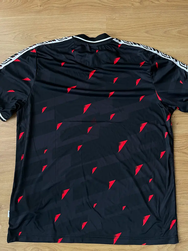 Stylish Black and Red Graphic Tee for Sale!