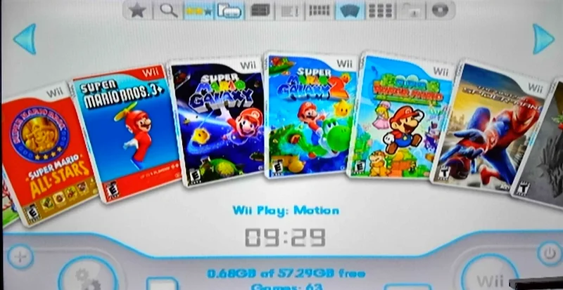 Nintendo Wii with Fit board and 2 controllers + 30 games.63204868566147111