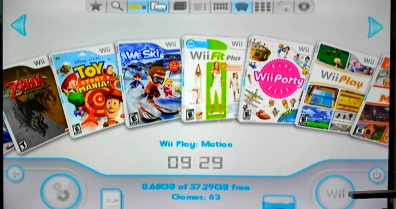 Nintendo Wii with Fit board and 2 controllers + 30 games.63204868566147112