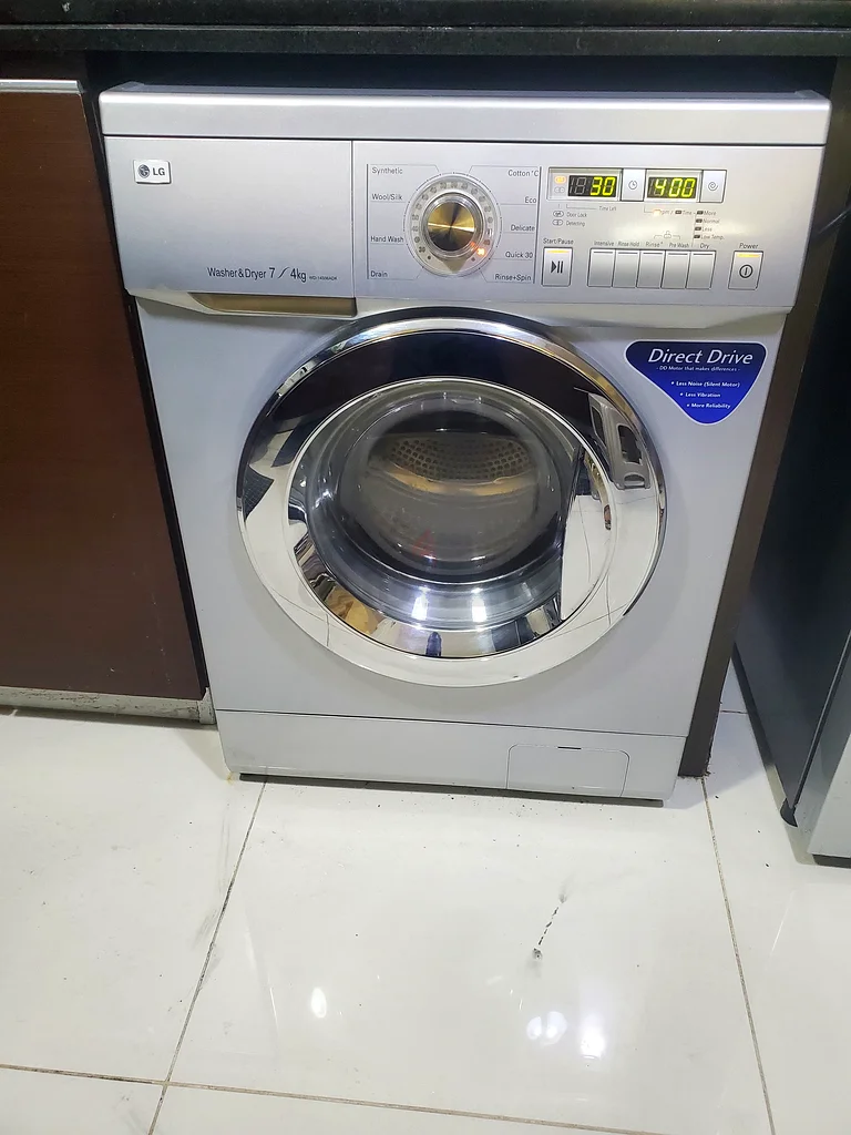 غسالة تجفيف أمامية التحميل أوتوماتيكية من إل جي بمحرك مباشر 7+4 كجم63199639778306111