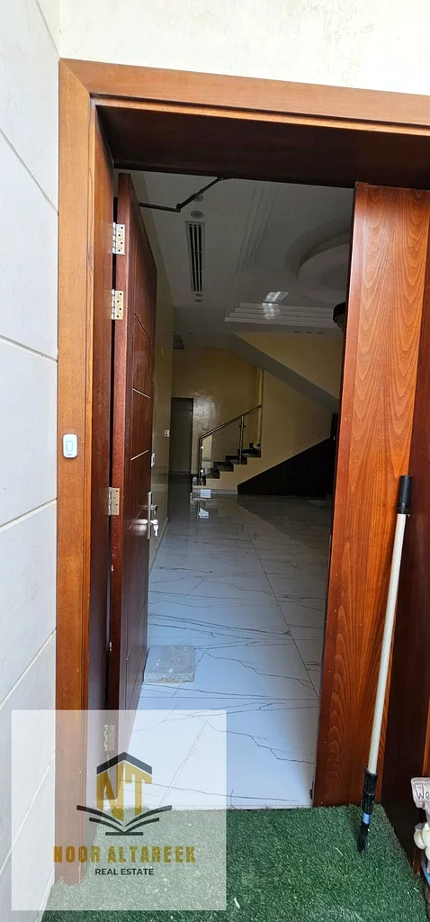 A two-story villa in Ajman. The first floor has a hall with a private bathroom, a master maid’s roo63235097615490114