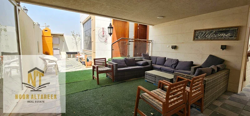 A two-story villa in Ajman. The first floor has a hall with a private bathroom, a master maid’s roo63235097615490111