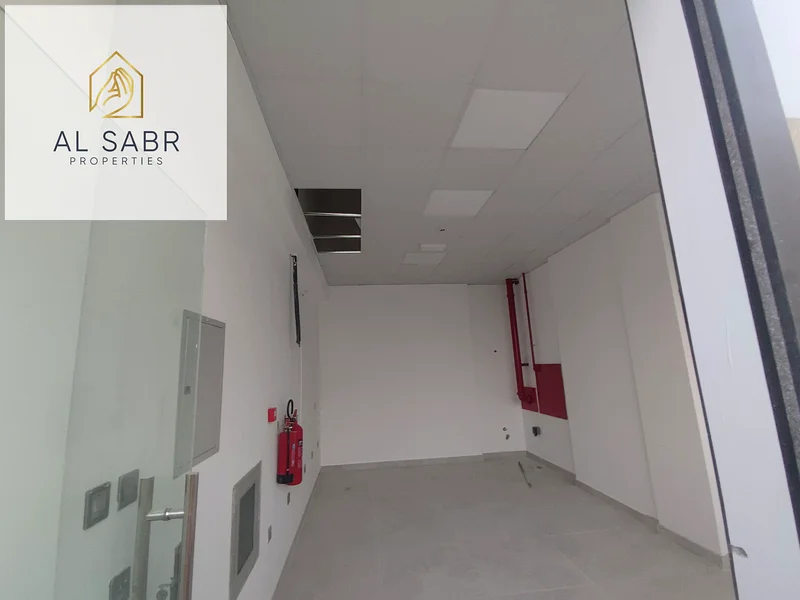 Main Road Brand New Shop | Prime Location | Al Jurf 363221328057347113