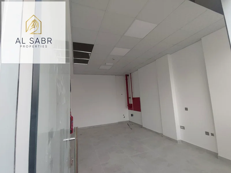 Main Road Brand New Shop | Prime Location | Al Jurf 363221328057347112