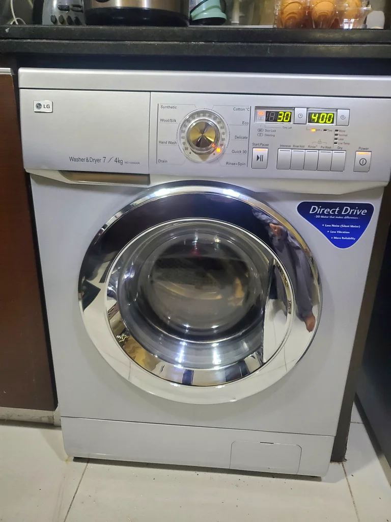 غسالة تجفيف أمامية التحميل أوتوماتيكية من إل جي بمحرك مباشر 7+4 كجم63199639778306112