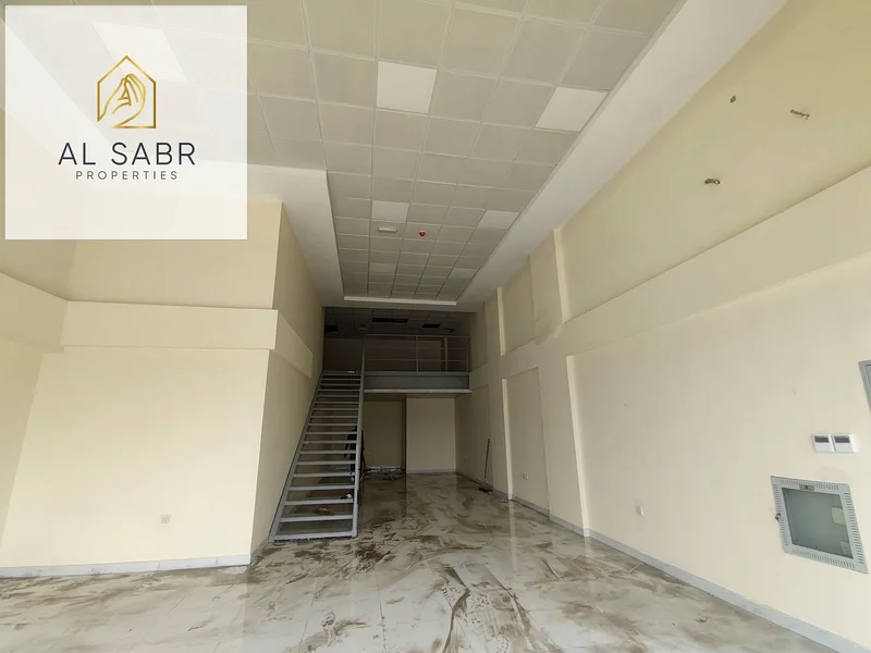Main-Road Facing Showroom (~1,248 sqft), ground + mezzanine .63221328034178111