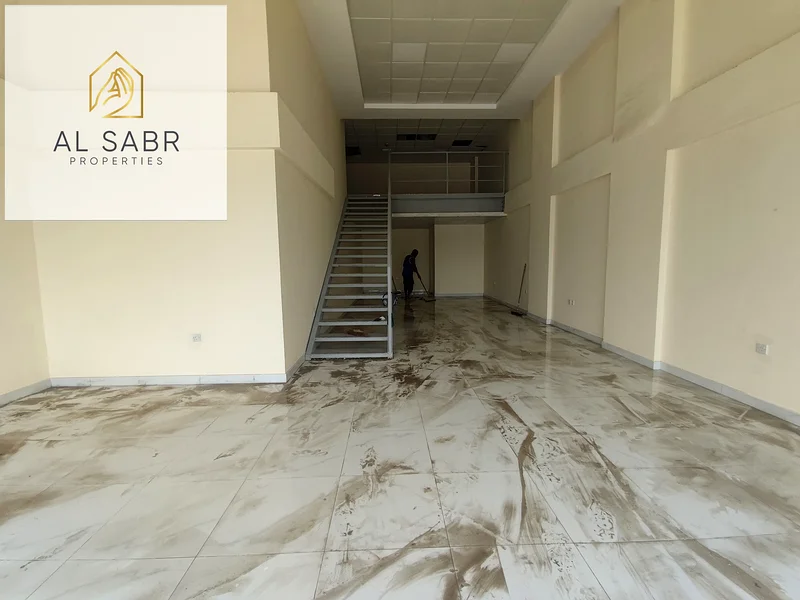 Main-Road Facing Showroom (~1,248 sqft), ground + mezzanine .63221328034178112