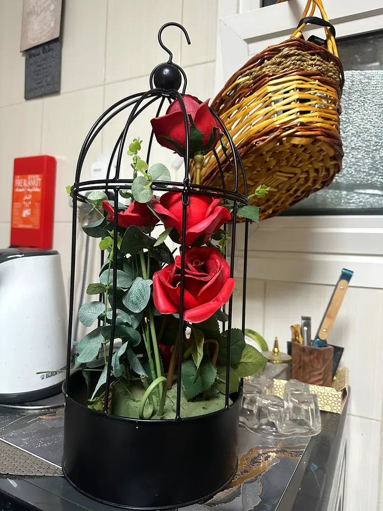 Flower cage with flowers