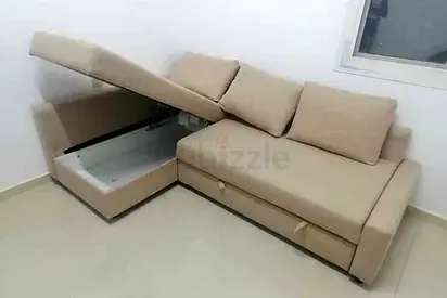 IKEA L Shape Sofa cum bed with big storage and you can fix the storage left or right