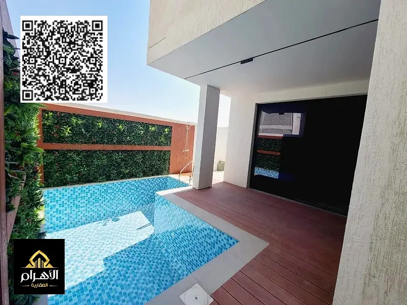 Modern villa with 5BR, with a pool and a roof, including water, electricity, AC and reg fees, ALBahia,super deluxe finishing, freehold, bank financing63882220885506112