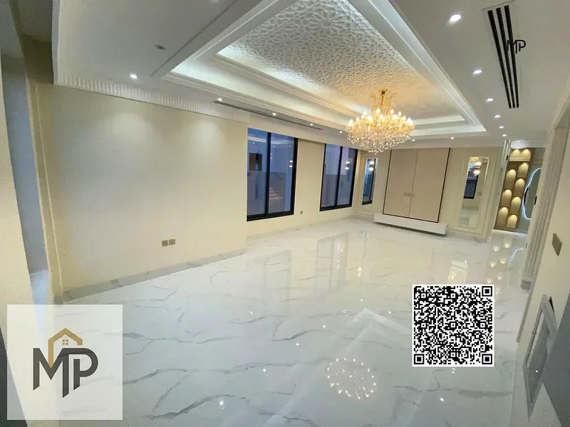 فيلا فاخرة بتصميم كلاسيكي في موقع متميز أمام مجمع أزها، وبسعر يشمل رسوم التسجيل ورسوم الملكية.63913652696579112