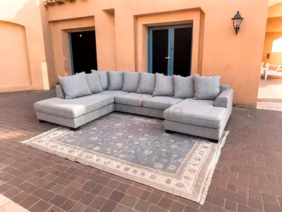 Selling the one Kingstone Stylish Grey U Shaped Sofa with Elegant Rug for Sale!